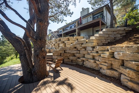 Residential landscape design boulder retaining wall 4