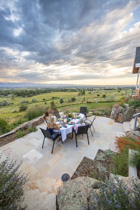 Residential landscape design client eating on patio9
