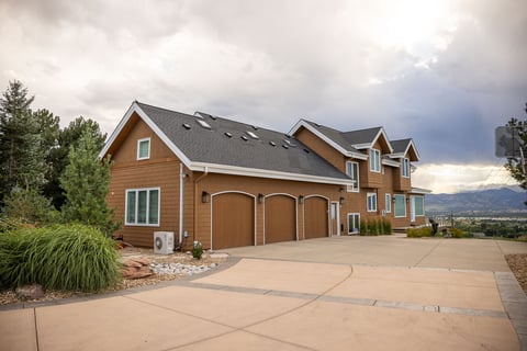 Residential landscape design garage driveway view 1