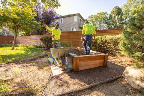 landscape design contstruction crew building garden bed