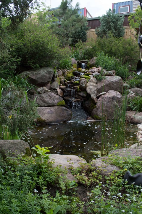 residential waterfall and pond