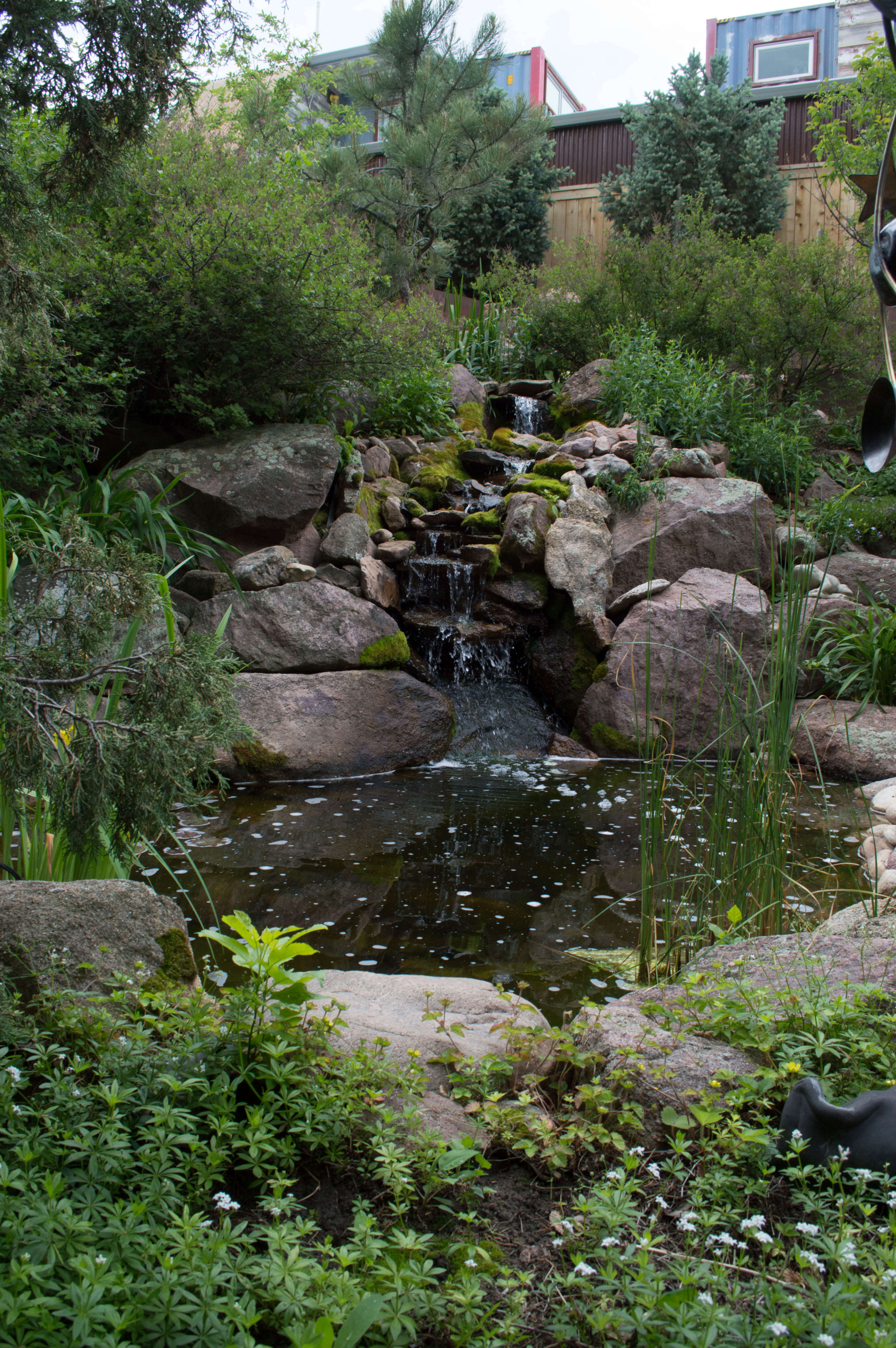 residential waterfall and pond